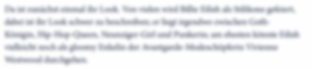 Ein stark verschwommener Text, der nicht lesbar ist.