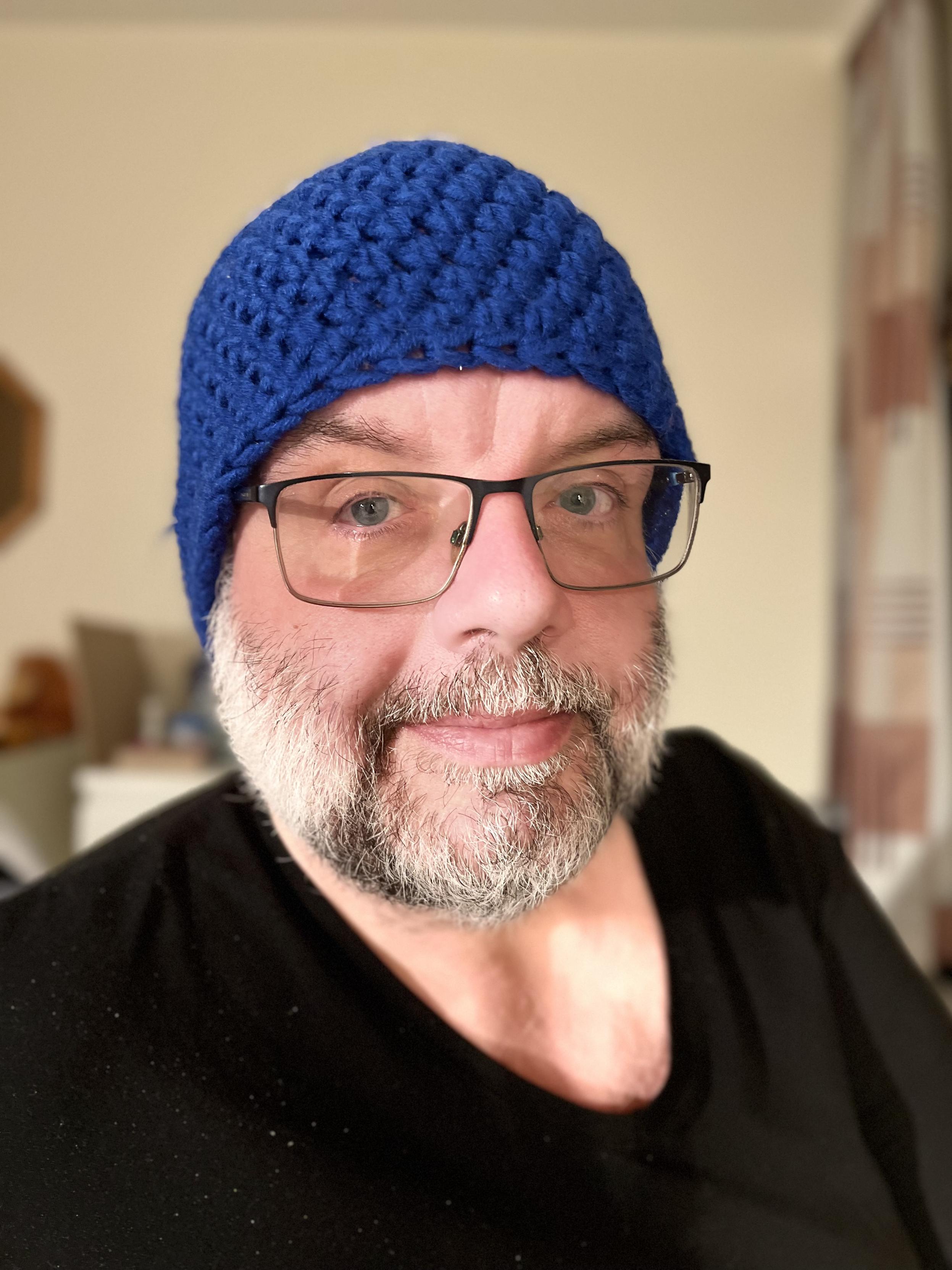 Profilfoto Robert Lender mit blauer Strickhaube